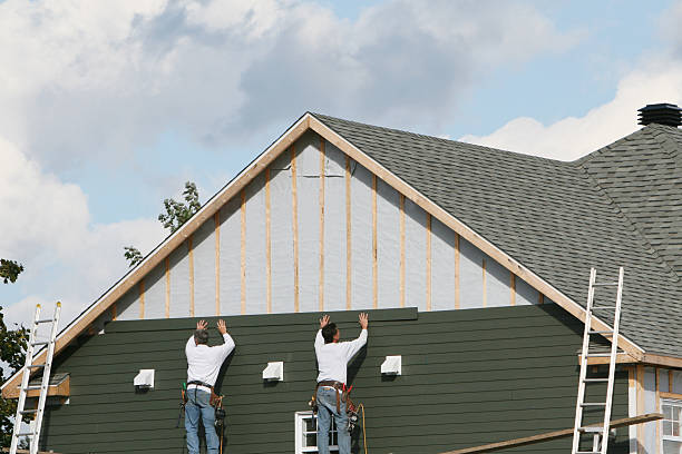 Professional Emergency Siding Repair technician working in Medford, MA